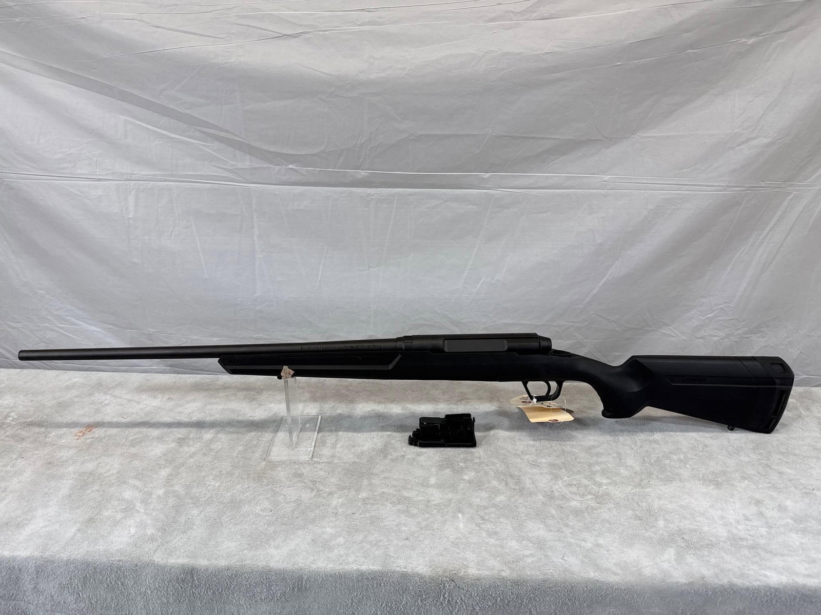Savage Axis 6.5 Creedmoor Bolt Action Rifle: 114.2 used like new condition 22 in barrel good rifling shinny bore black synthetic stock detachable magazine sn N819509