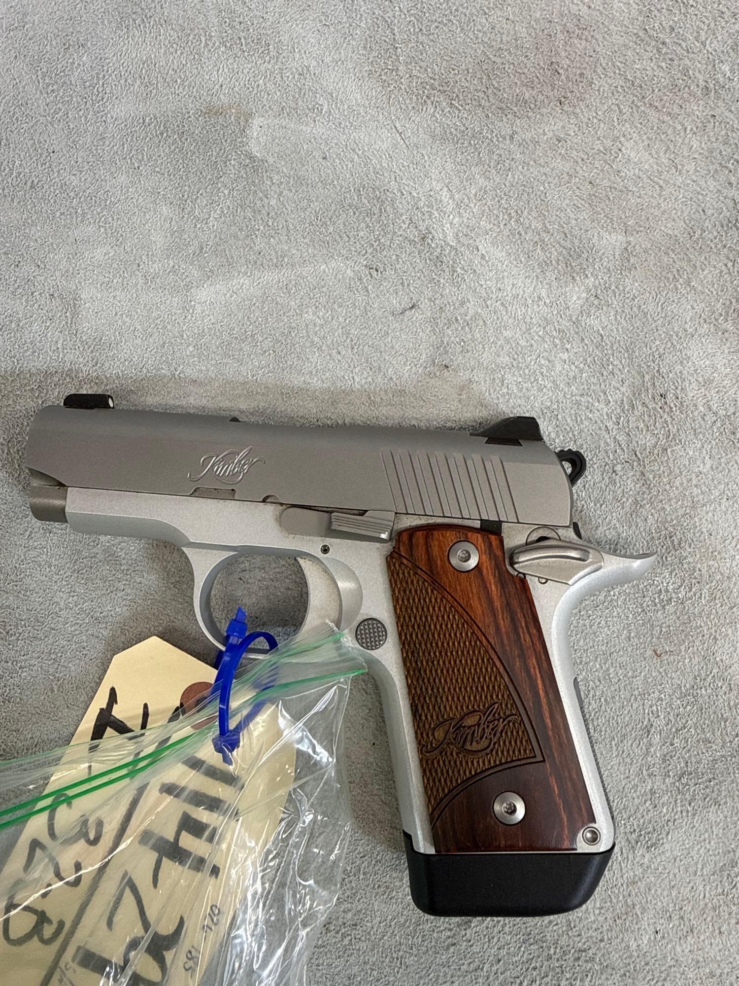 Kimber Micro 9 9mm Semi Auto Pistol: 114.29 Used like new 3 inch barrel with good rifling shinny bore slide moves smooth nice trigger come with extra mag s/n PB0250001