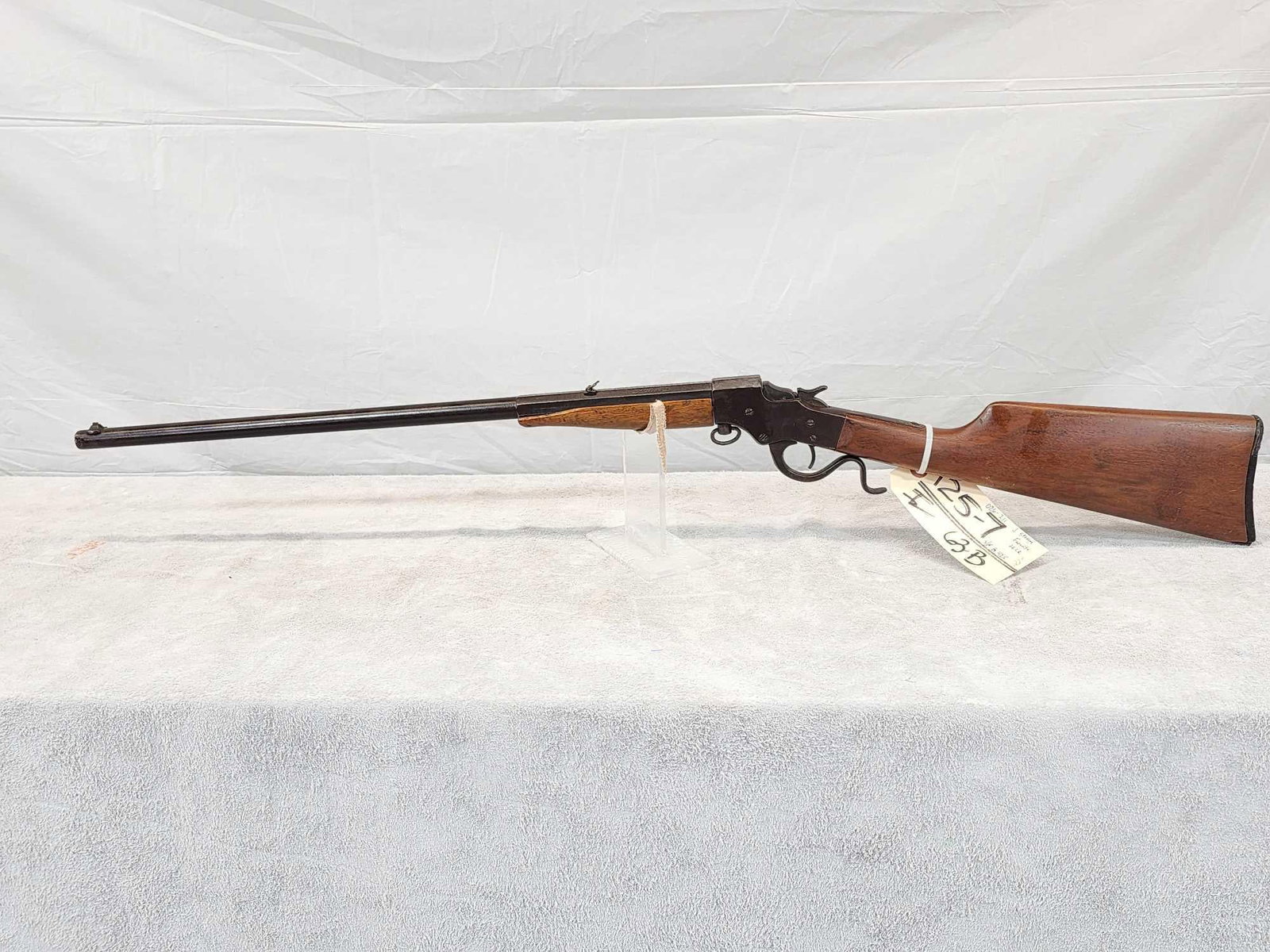 J. Stevens A.& T. Co Favorite. 22 Falling Block Single Shot Rifle: 125.7 Good condition for its age 22" barrel fairly shiny bore decent rifling flip up rear sight SN G425