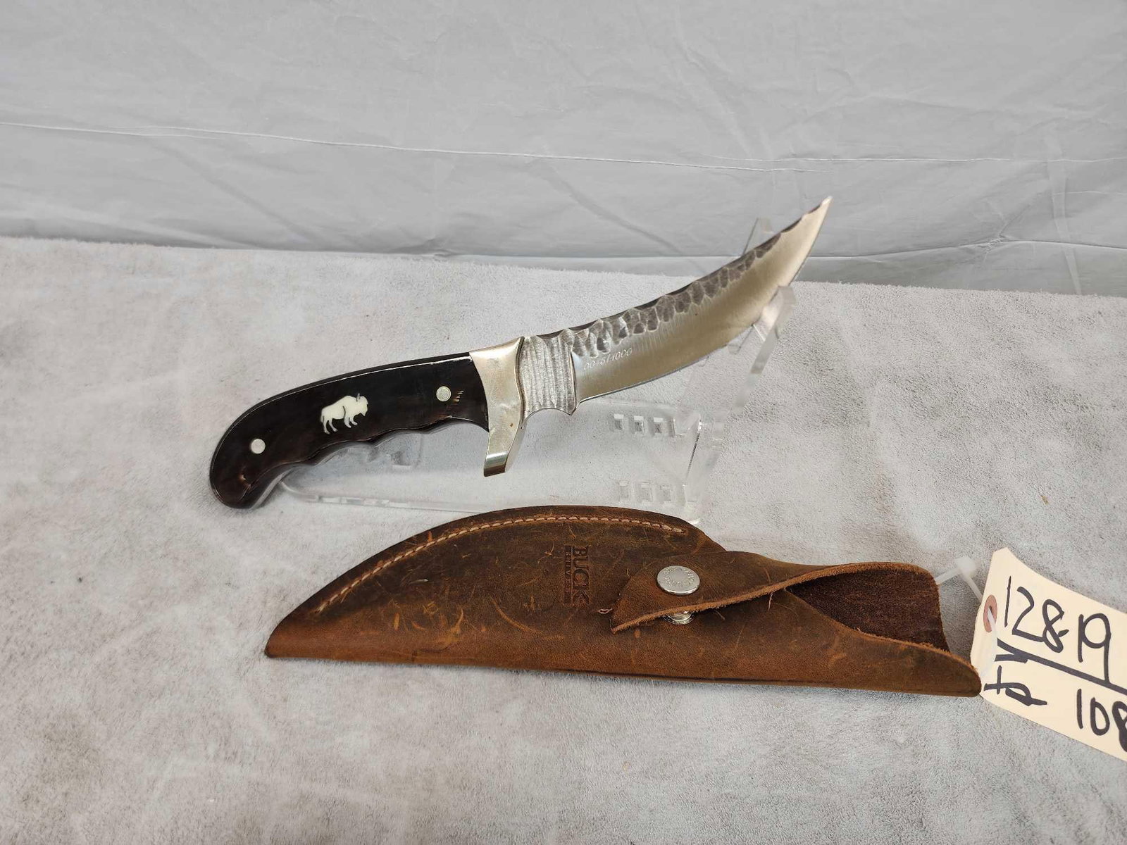 Buck Custom Fixed Blade Knife With Sheath: 128.19 Like new condition numbered 45 of 1000 5 1/2" blade with Buffalo horn handle like new condition