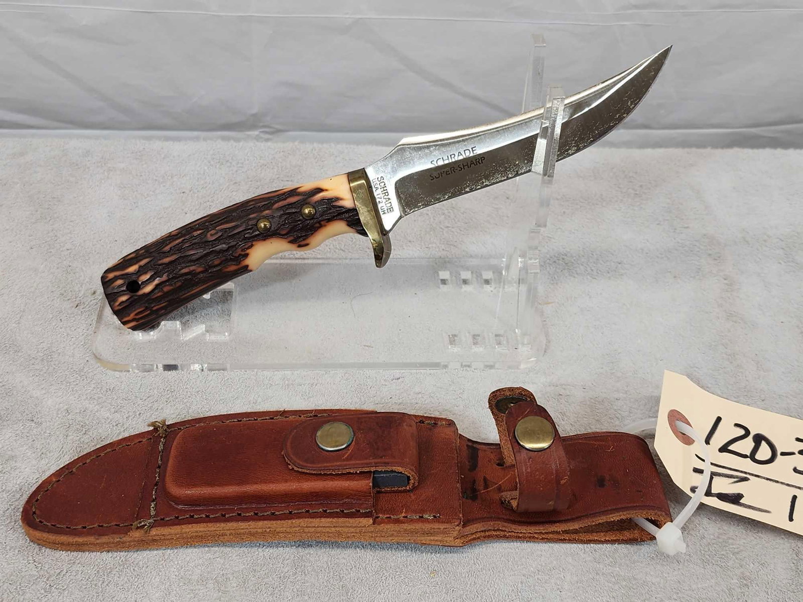 Schrade Super Sharp Fixed Blade Knife: 120.39 Like new condition 5" blade with sheath stone still has cosmoline on the blade