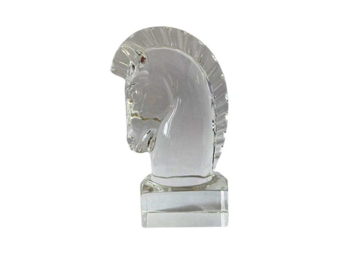 Steuban Crystal Horse Head Figurine: Add an air of equestrian style to your work space with this stately horse head decor. Designed by Sidney Waugh in 1937, it is crafted from crystal for a glint of glamour. Ideal as both an accent and p