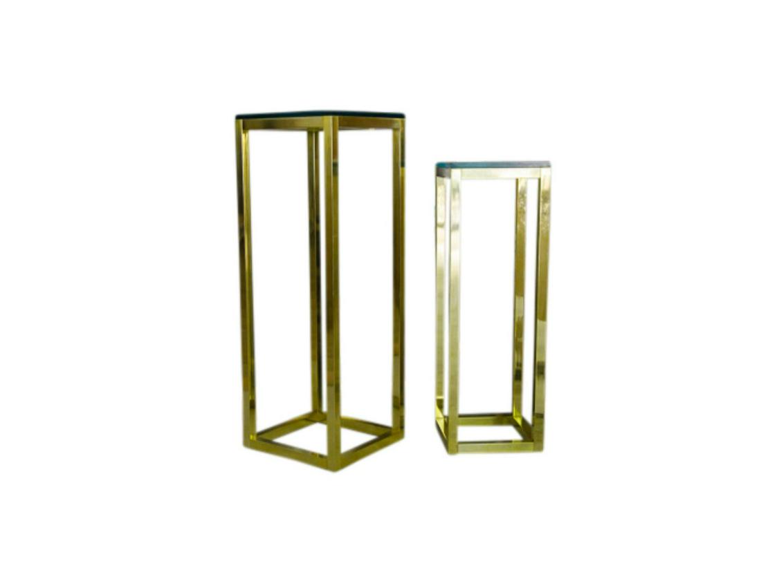 Mastercraft Brass Plated & Glass Pedestal Tables: An inspired combination of brass and glass, these streamlined Mastercraft pedestal tables are vintage pieces with modern-day appeal. While they’ve got minor wear, they boast major style points. Tall