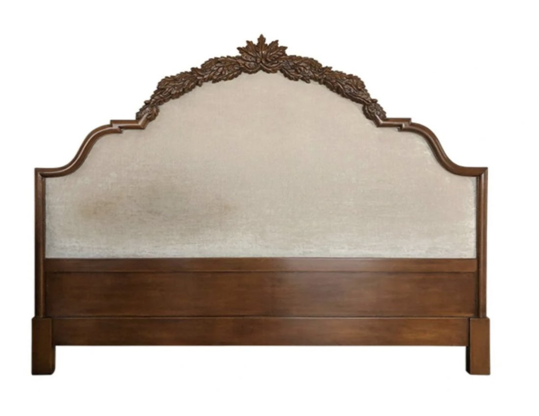 Exquisite King Headboard with Carved Acorn Motif: Turn your master suite into a restful retreat fit for a royal with this headboard. Its frame sets a traditional tone, showcasing carved details and a stately brown finish. Beige chenille upholstery up
