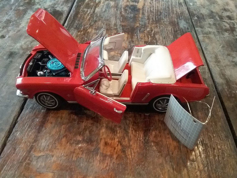 Red convertible Ford Mustang (1 of 3)