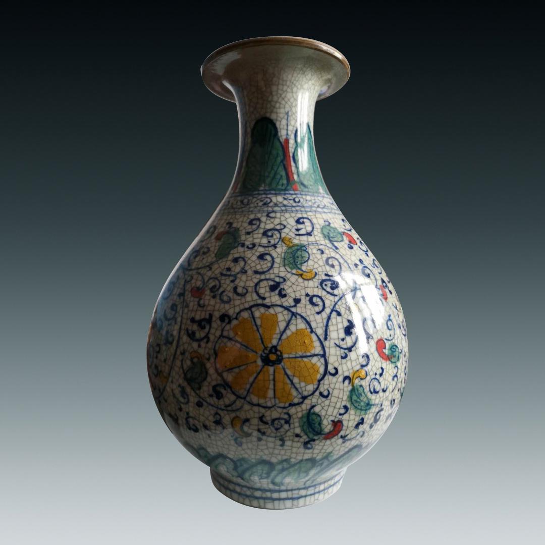 A POLYCHROME GLOBULAR VASE (1 of 3)