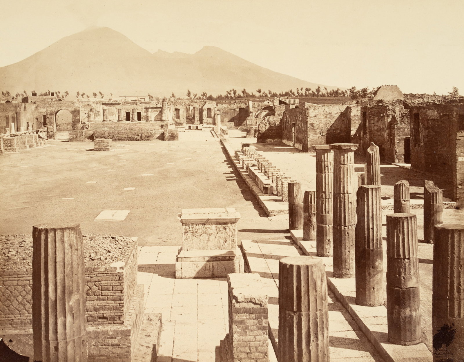 FRATELLI ALINARI (19th) Circle, Forum Civile, Pompeii, around 1880, albumen paper print: Fratelli Alinari (19th century) Circle: "Italy: The Forum civile in Pompeii", charming view of historic Italy with the outline of Mount Vesuvius in the distance, c. 1880, albumen paper print Technique