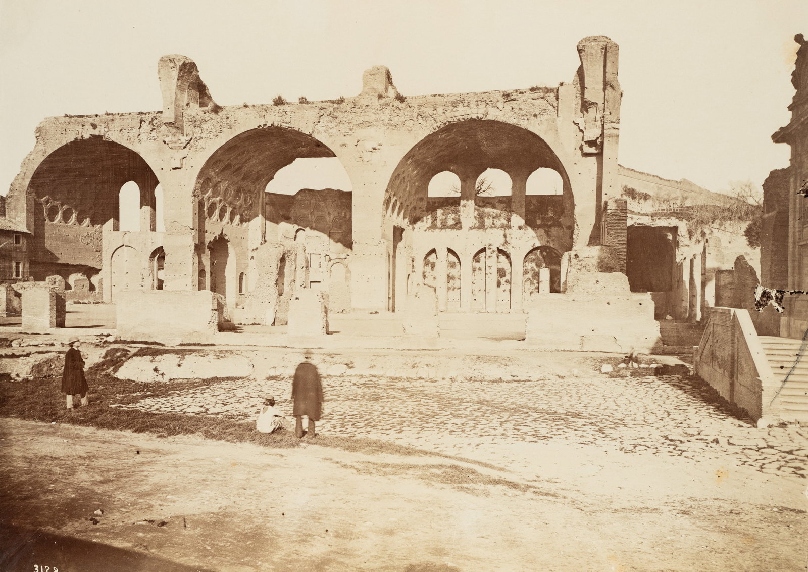 Unknown (19th), Basilica of Maxentius, Roman Forum, Antiquity, around 1870, albumen paper print: Unknown (19th century): View of the Roman Basilica of Maxentius with visitors on the forecourt, Roman Forum, Rome, c. 1870, albumen paper print Technique: albumen paper print Date: c. 1870 Description