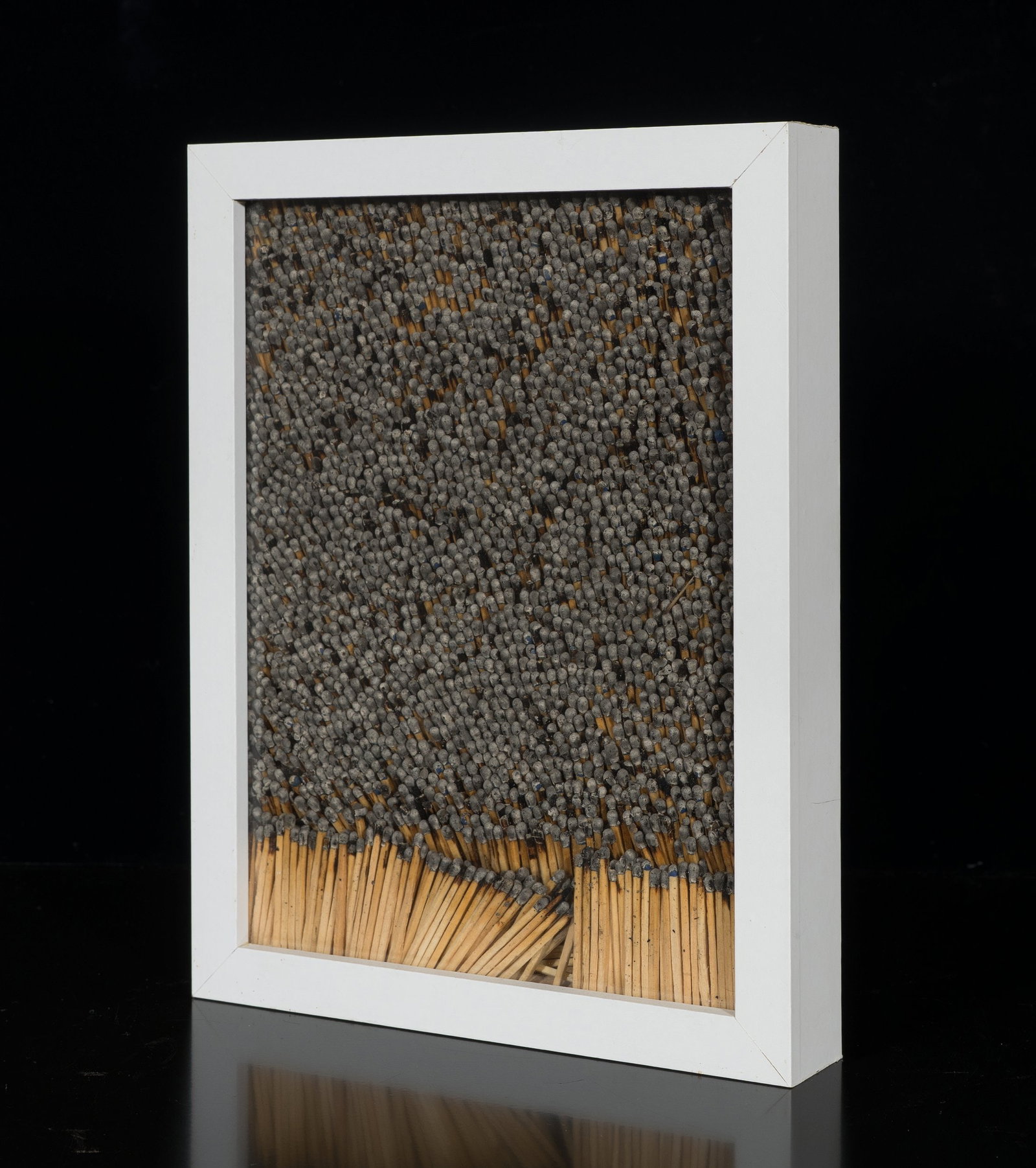 K. PAUL (*1966), Burnt out. Assemblage made from matches, 2013, Wood: Katrin Paul (born 1966 ): Burnt out Assemblage made from matches Large-scale object assemblage comprising thousands of burnt-out matches in a white frame, 2013, Wood Technique: Wood, Wood Inscription: