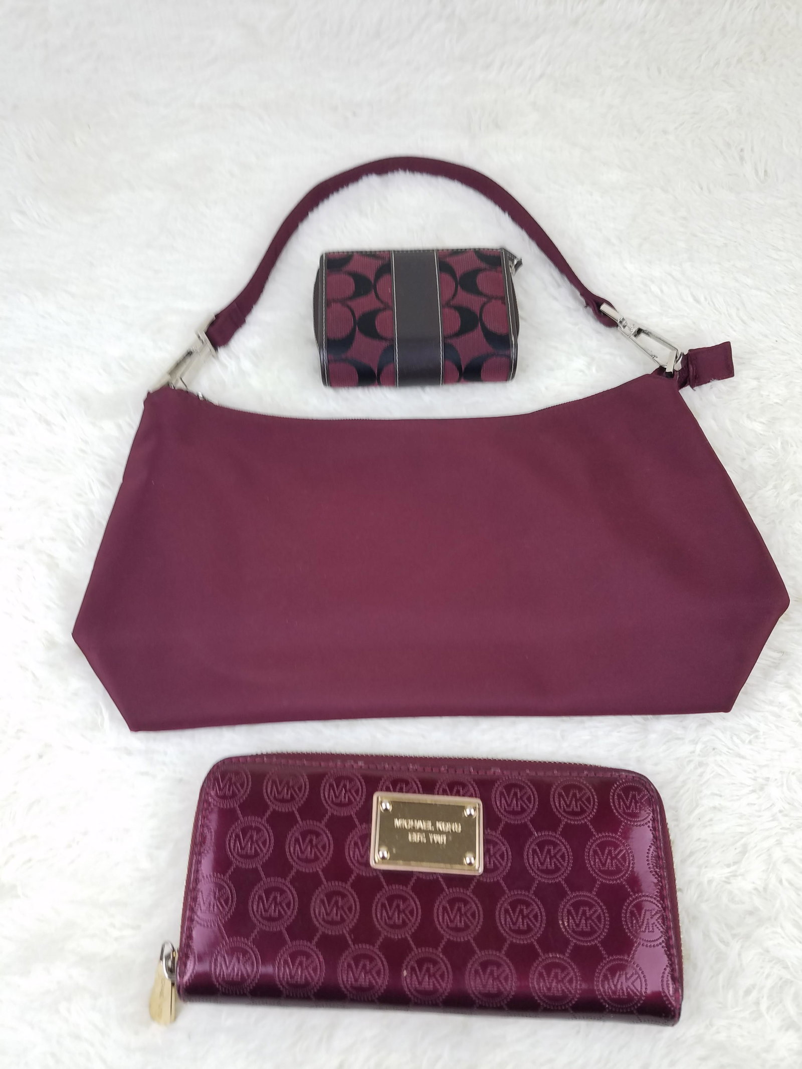 Designer Purse & Wallet Set 1 Cherokee 1 Coach 1: Brand: Cherokee, Gucci, Michael Kors Material: Canvas, Patent Leather, Man Made Style: Fold, Zip Color: Maroon Size(inch): Country of Origin: China Come with: - Rabbit's Habit items come with a 100% m