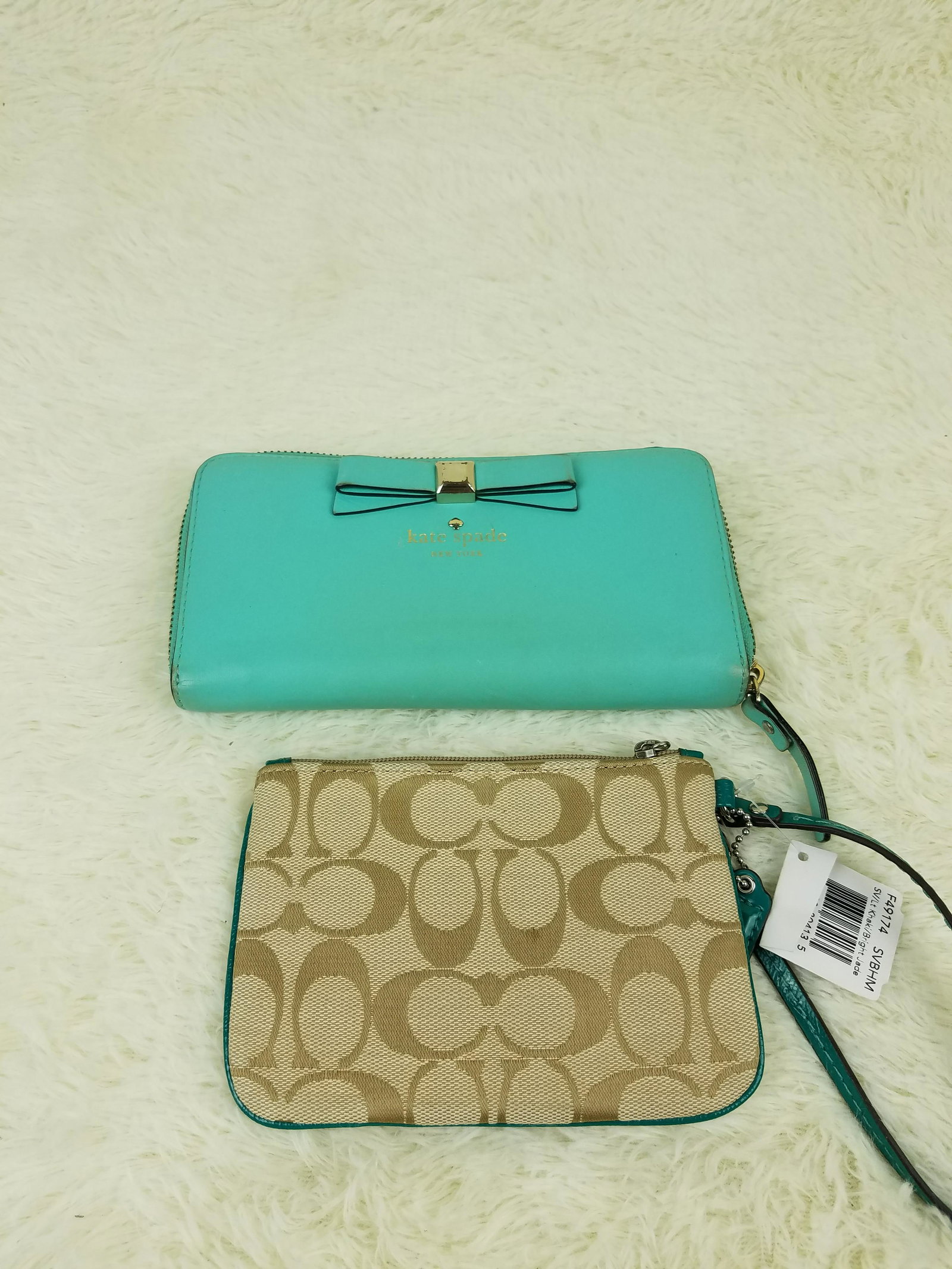 Lot of 2 Wallets: 1 Kate Spade and 1 Coach: Brand: Kate Spade, Coach(NWT) Material: Kate Spade: Leather Coach(NWT): Canvas Style: Clutch and Wristlet Color: Tiffany Blue Size(inch): Kate Spade: 7.25 x 4.5 and Coach: 6 x 4.25 Country of Origin: 