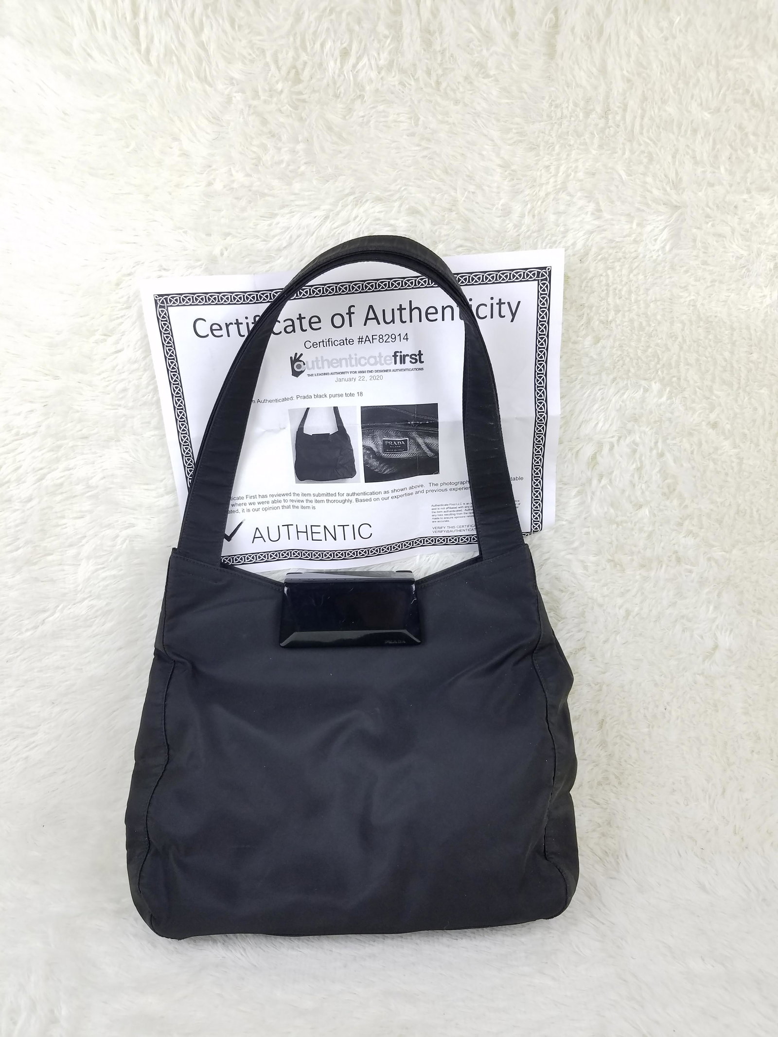 Prada Nylon Black Handbag w/AUTHENICATION PAPER: Brand: Prada Material: Nylon Style: Handbag Color: Black Size(inch): 13.5 x 10 x 9.25 Country of Origin: Italy Come with: AUTHENICATION PAPER Rabbit's Habit items come with a 100% money-back authentic