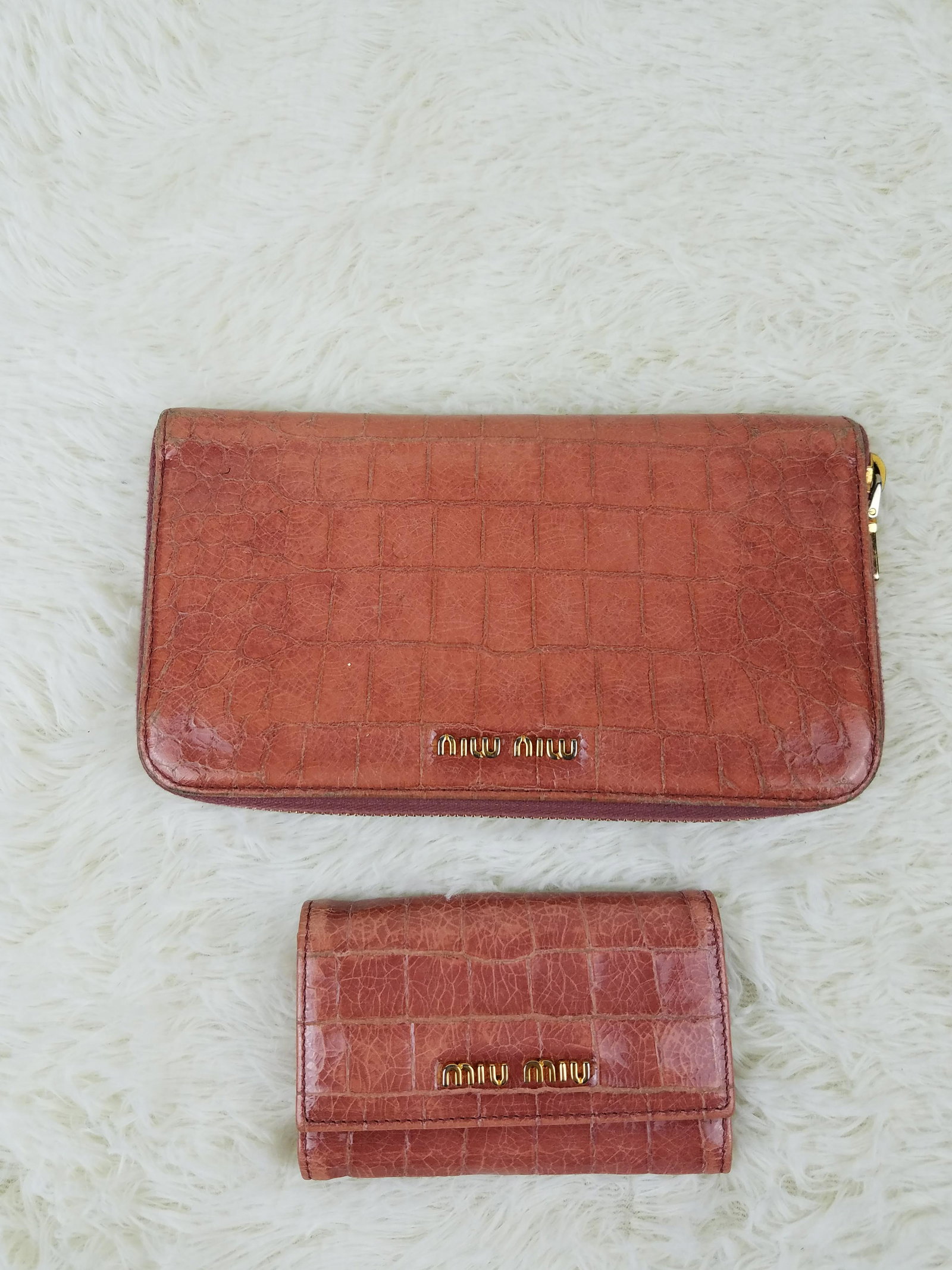 Pink Miu Miu By Prada Wallet Set: Brand: Miu Miu Material: Leather Style: Lot Color: Pink Size(inch): Country of Origin: Italy Come with: - Rabbit's Habit items come with a 100% money-back authenticity guarantee. Please refer to image