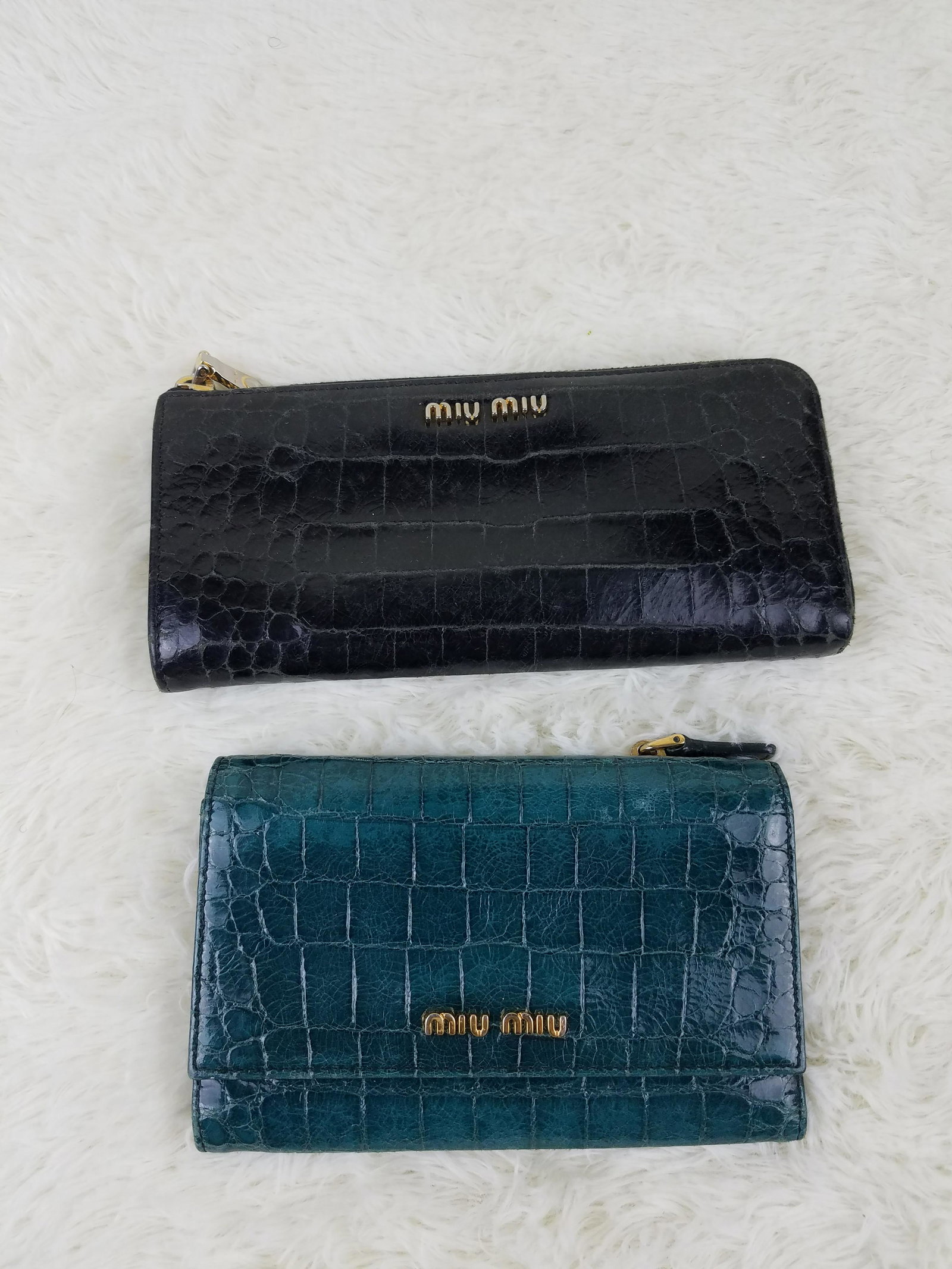 2 Miu Miu Wallet Set Black Green Leather Wallet: Brand: Miu Miu Material: Leather Style: Color: Black, Green Size(inch): Country of Origin: Italy Come with: - Rabbit's Habit items come with a 100% money-back authenticity guarantee. Please refer to i