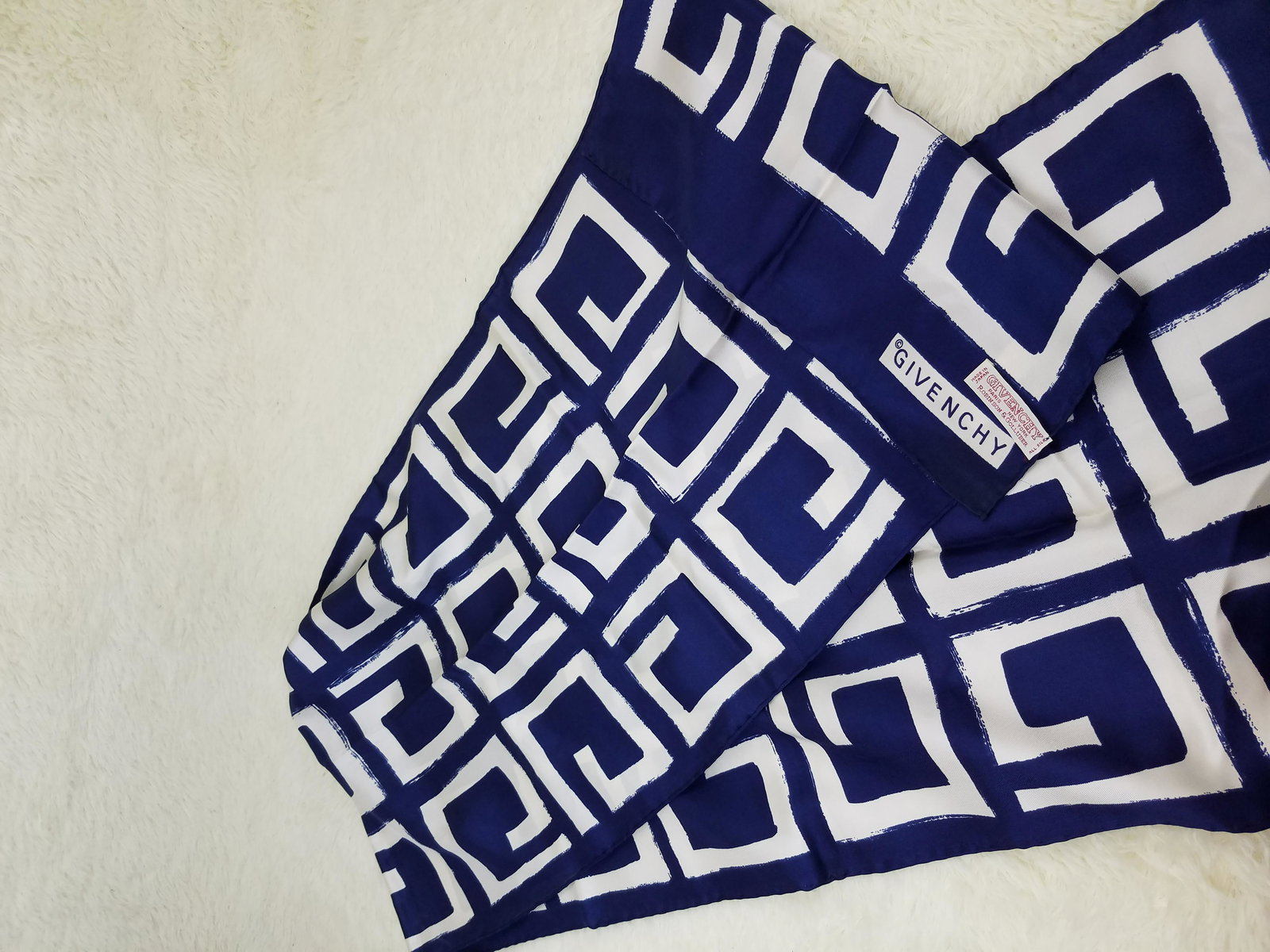 Givenchy Blue/White Scarf: Brand: GIVENCHY Material: Silk Style: Color: Blue/White Size(inch): 15 x 65 Country of Origin: Come with: - Rabbit's Habit items come with a 100% money-back authenticity guarantee. Please refer to ima