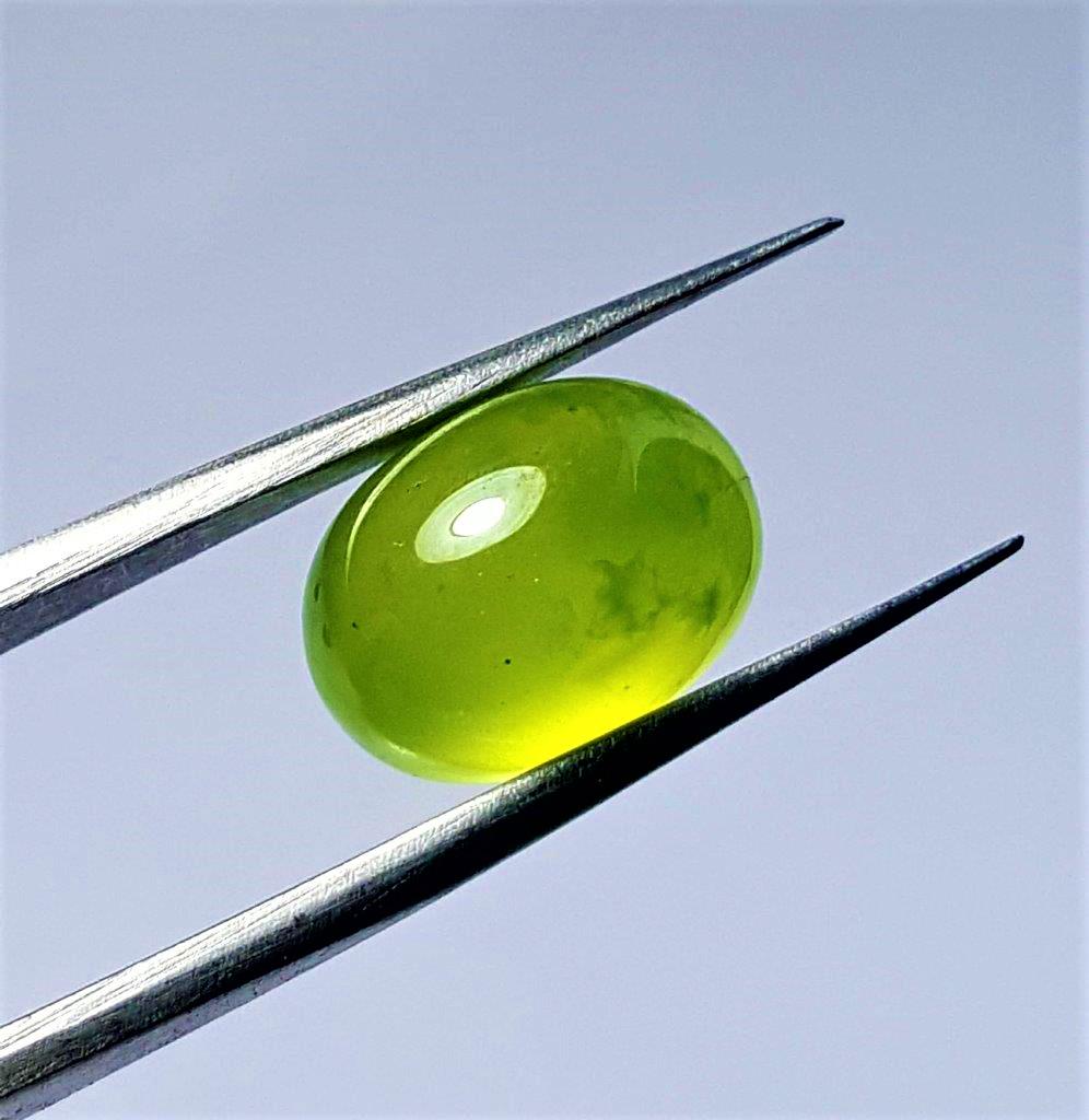 8.5 Carats Grossular Garnet Cab Oval Shape: 8.5 Carats Grossular Garnet Cab Oval Shape 14X10X7MM, January Birthstone, Beautiful Lemon Green Color : Flat-rate of $23.00 to anywhere. shipping rates are determined by Parcel weight and destination.