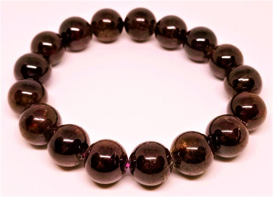 Beautiful Natural Garnet Beaded Bracelet: Beautiful Purplish Natural Garnet Beaded Bracelet : Flat-rate of $23.00 to anywhere. shipping rates are determined by Parcel weight and destination. Combined shipping: We offer combine shipping on mul