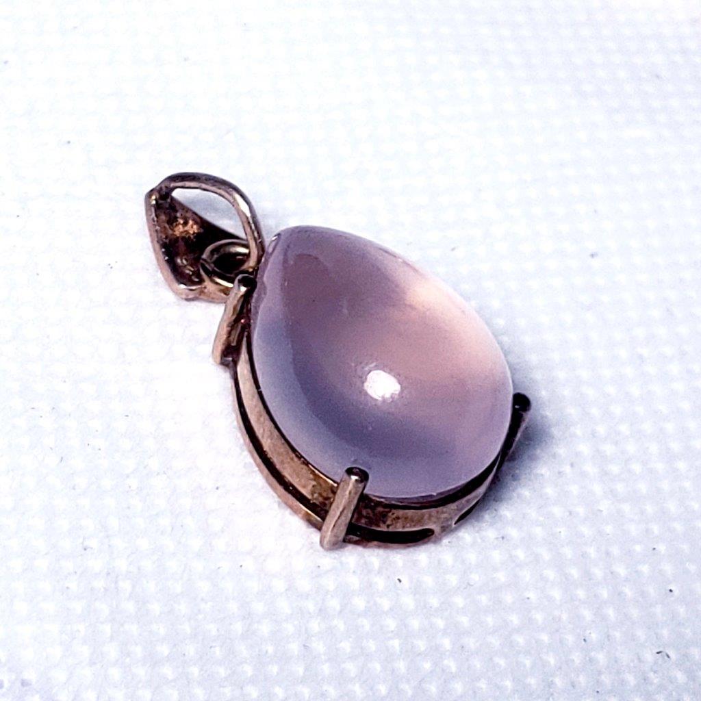 Gold Coated Moon Stone Healing Pendant: Gold Coated Moon Stone Healing Pendant - 24X15X13 mm: Worldwide: Flat-rate of $23.00 to anywhere.shipping rates are determined by Parcel weight and destination.