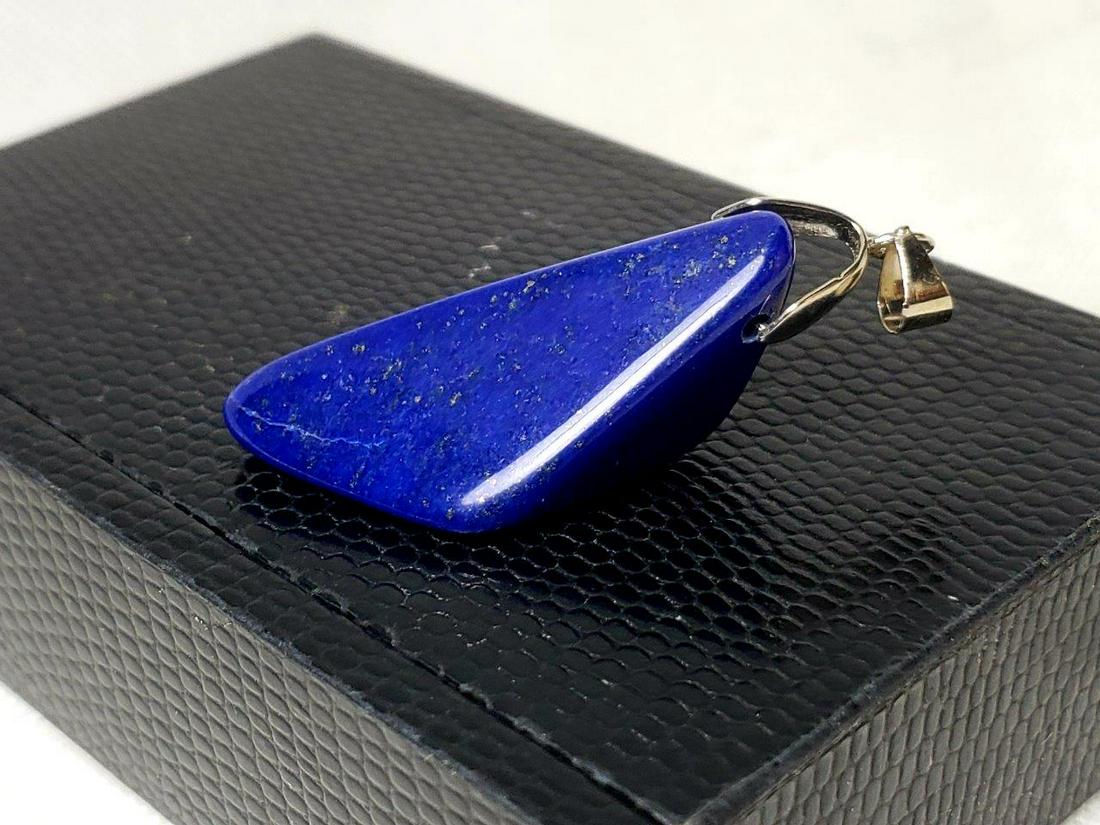 Sterling Silver Lapis Lazuli Pendant - Chakra Jewelry: Sterling Silver Lapis Lazuli Pendant - Chakra Jewelry- 45X19X12mmShipping: $23.00.shipping rates are determined by Parcel weight and destination.