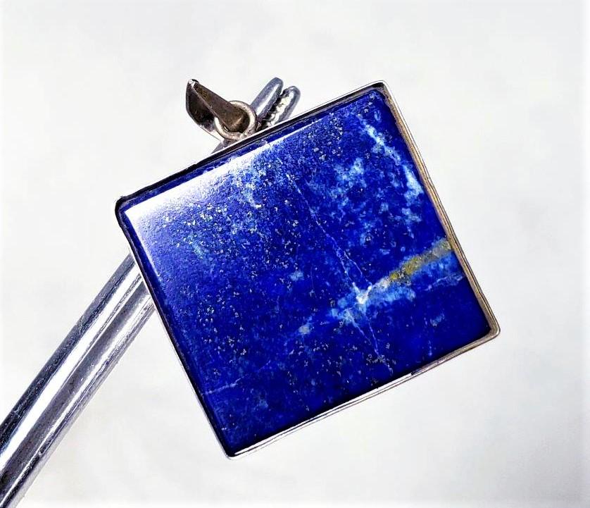 Lapis Lazuli Healing Pendant: Lapis Lazuli Healing Pendant - 29X27X4 mmShipping: $23.00.shipping rates are determined by Parcel weight and destination.