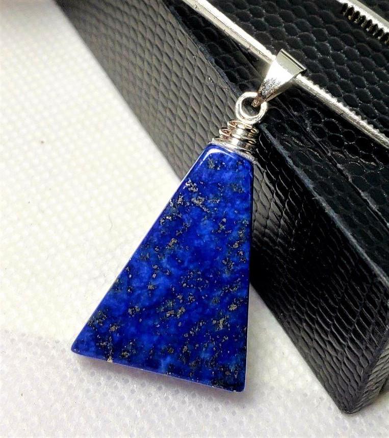 Lapis Lazuli With Pyrite Pendant: Lapis Lazuli With Pyrite Pendant - 28X21X9 mmShipping: $23.00.shipping rates are determined by Parcel weight and destination.
