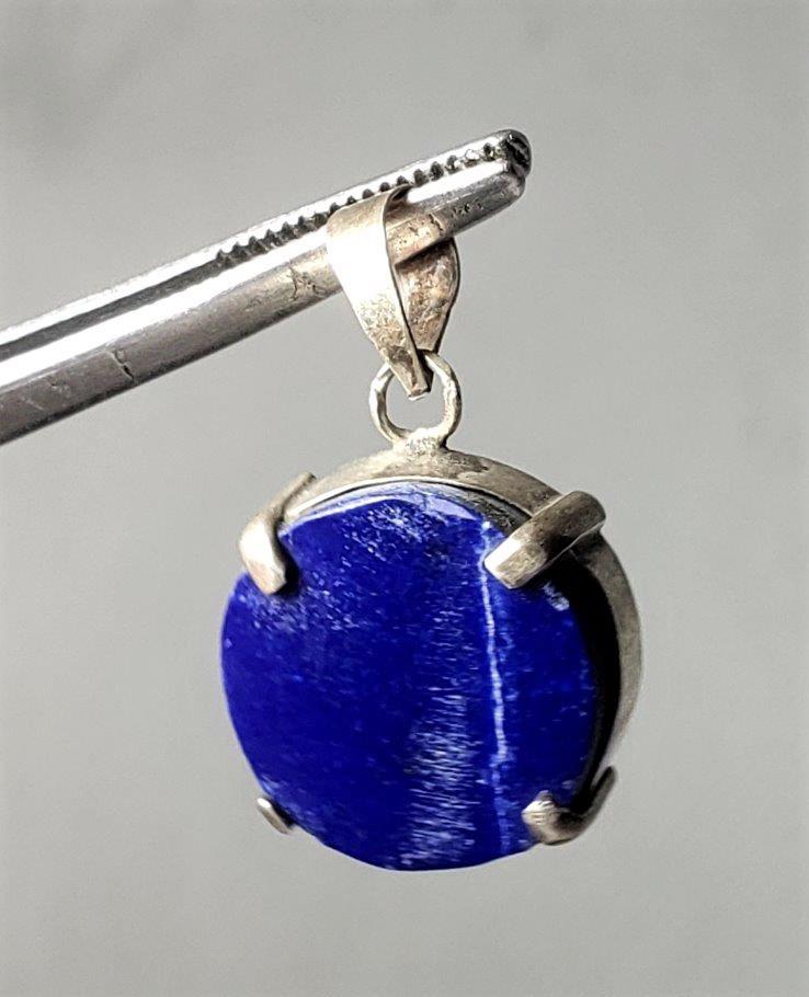 Beautiful Sterling Silver Lapis Lazuli Pendant: Beautiful Sterling Silver Lapis Lazuli Pendant - 18X18X6 mmShipping: $23.00.shipping rates are determined by Parcel weight and destination.