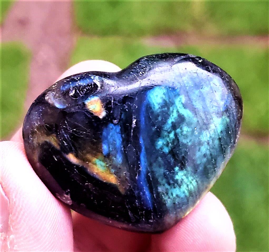 Labradorite Polished Tumbled Stone: Labradorite Polished Tumbled Stone - 43X47X19 mmShipping: $23.00.shipping rates are determined by Parcel weight and destination.