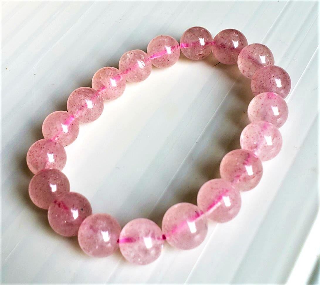 Calcite pink bracelet, white coral beads (1 of 2)