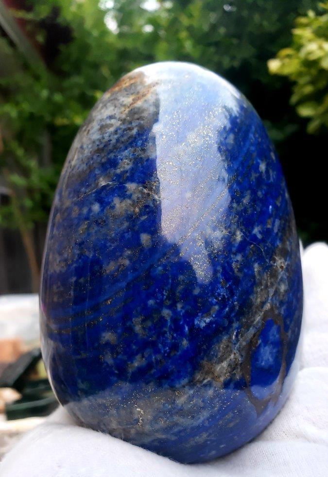Hand Carved Polished Lapis Lazuli Egg - 368 Grams: Hand Carved Polished Lapis Lazuli Egg - 368 Grams - 79X53 mm Shipping: $30.00. Shipping rates are determined by Parcel weight and destination.