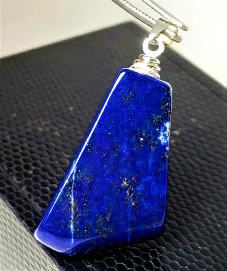 Natural silver Lapis Lazuli Pendant: Natural silver Lapis Lazuli Pendant - 43X23X8 mm Shipping: $23.00. Shipping rates are determined by Parcel weight and destination.