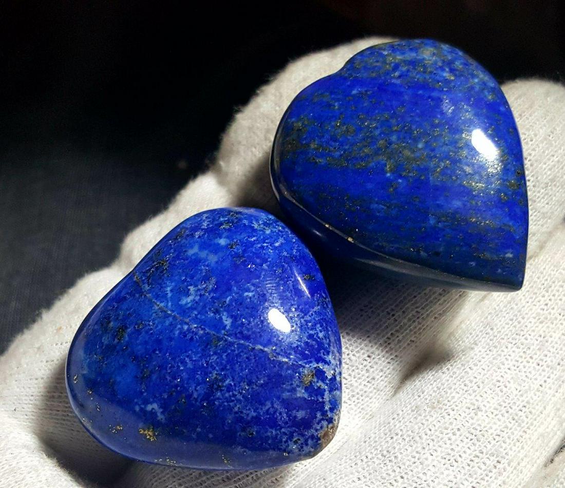 Lapis Lazuli Crystal Carved Paired Hearts - 52.8 Grams: Lapis Lazuli Blue Crystal Carved Paired Hearts - 52.8 GramsShipping Rate: $23.00 .shipping rates are determined by Parcel weight and destination.Combined shipping: We offer combine shipping on multipl