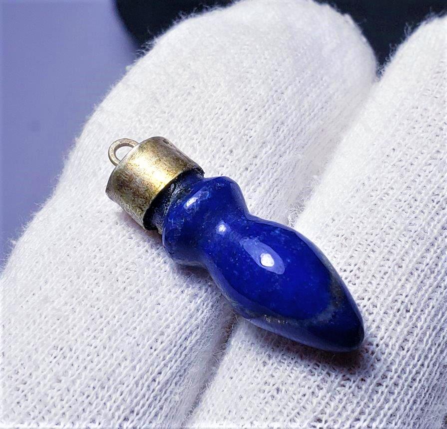Sterling Silver Lapis Lazuli Pendant: Sterling Silver Lapis Lazuli Pendant - 27X7X7 mm Shipping: $23.00. Shipping rates are determined by Parcel weight and destination.
