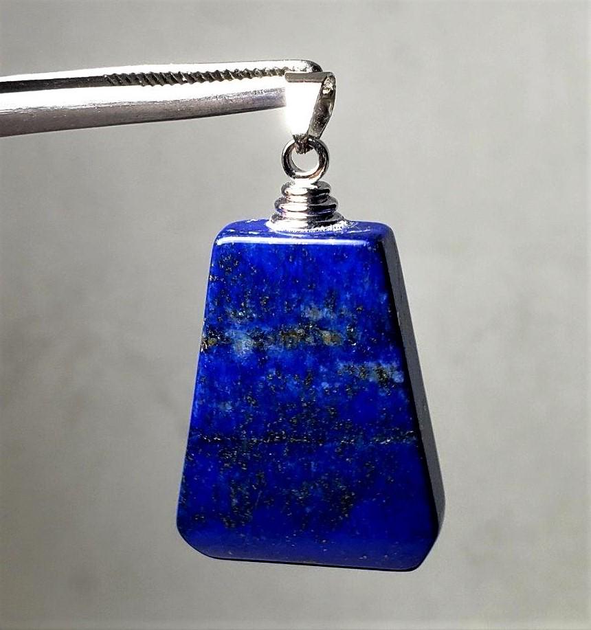 Sterling Silver Lapis Lazuli Pendant: Sterling Silver Lapis Lazuli Pendant - 30X23X7 mm Shipping: $23.00. Shipping rates are determined by Parcel weight and destination.