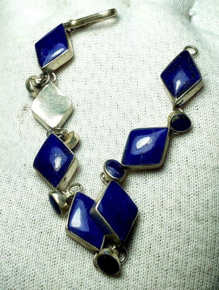 Beautiful Lapis Lazuli Beaded Bracelet in Silver: Beautiful Lapis Lazuli Beaded Bracelet in Silver Shipping: $23.00. Shipping rates are determined by Parcel weight and destination.