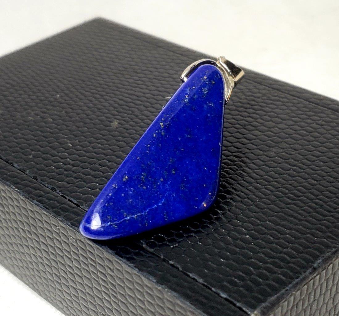 Sterling Silver Lapis Lazuli Pendant - Chakra Jewelry: Sterling Silver Lapis Lazuli Pendant - Chakra Jewelry- 45X19X12mm Shipping: $23.00. Shipping rates are determined by Parcel weight and destination.