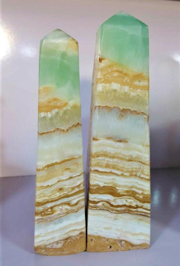 Caribbean Calcite Paired Towerss - 850 Grams: Caribbean Calcite Paired Towers Nice Pattern Bands - 850 Grams Shipping: $65.00. Shipping rates are determined by Parcel weight and destination.