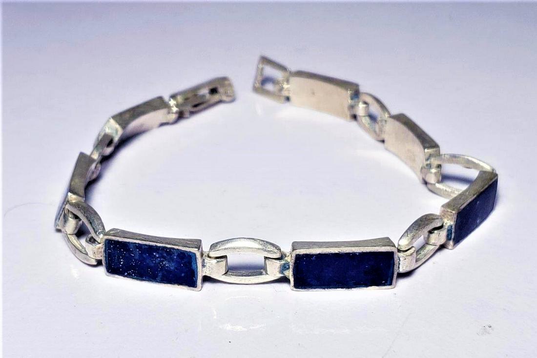 Lapis Lazuli Bracelet in Sterling Silver: Lapis Lazuli Bracelet in Sterling Silver Shipping: $23.00. Shipping rates are determined by Parcel weight and destination.