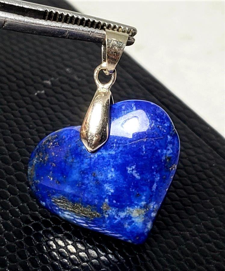 Sterling Silver Lapis Lazuli Heart Pendant: Sterling Silver Lapis Lazuli Heart Pendant - 25X26X10 mm Shipping: $23.00. Shipping rates are determined by Parcel weight and destination.