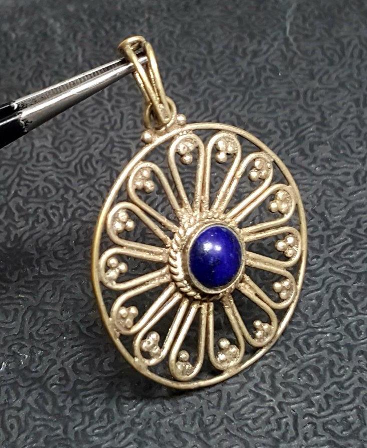 Lapis Lazuli Star Pendant in Sterling Silver: Lapis Lazuli Star Pendant in Sterling Silver Shipping: $23.00. Shipping rates are determined by Parcel weight and destination.