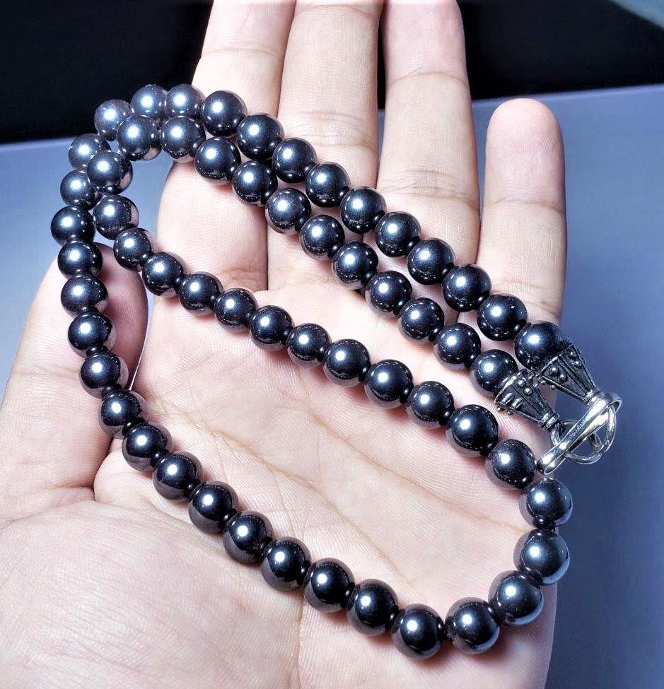 ClassiC Titanium Beaded Necklace: ClassiC Titanium Beaded Necklace Stainless Steel Beads Shipping: $23.00. Shipping rates are determined by Parcel weight and destination.