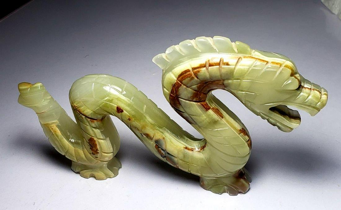 Hand Carved Onix Healing Dragon - Home Decor: Hand Carved Onix Healing Dragon - Home Decor Shipping: $23.00. Shipping rates are determined by Parcel weight and destination.
