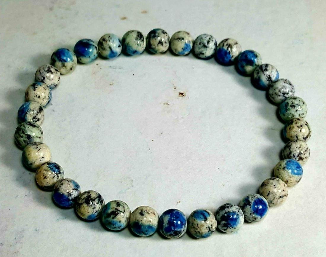 K2 Azurite in Granite Genuine Beaded Bracelet: K2 Azurite in Granite Genuine Beaded Bracelet Shipping: $23.00. Shipping rates are determined by Parcel weight and destination.