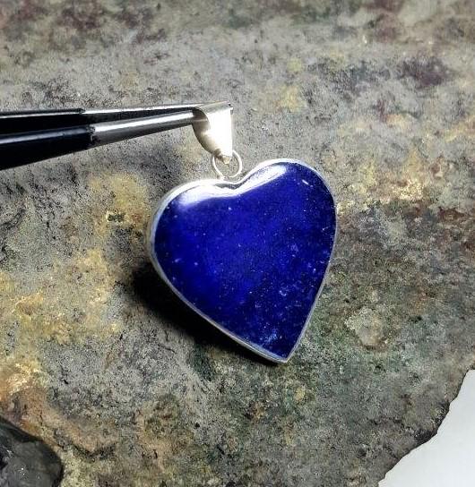 Natural Blue Lapis Lazuli Heart Shape pendant: Natural Blue Lapis Lazuli Heart Shape pendantShipping Rate: $23.00 .shipping rates are determined by Parcel weight and destination.Combined shipping: We offer combine shipping on multiple items purcha