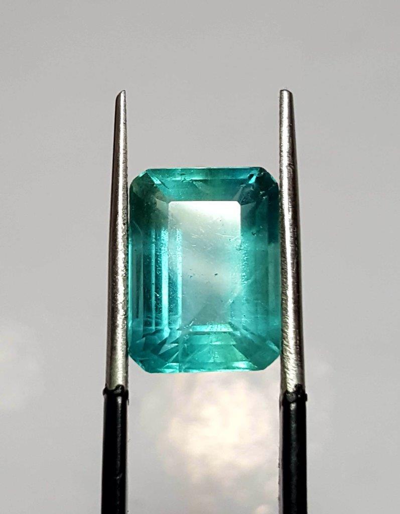 Paraiba Color Fluorite - 8.15 Carats: Paraiba Color Fluorite - 8.15 Carats - 14X10X7 mm Shipping: $23.00. Shipping rates are determined by Parcel weight and destination.