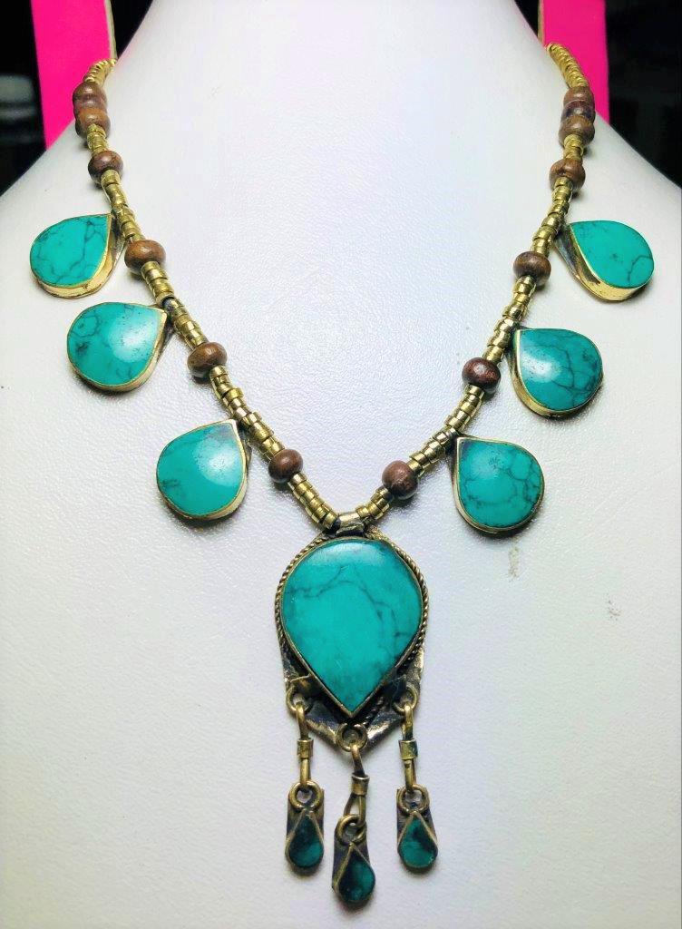 Chinese Export Turquoise Nugget Necklace: Chinese Export Turquoise Nugget Necklace. Knotted Shipping: $23.00. Shipping rates are determined by Parcel weight and destination.