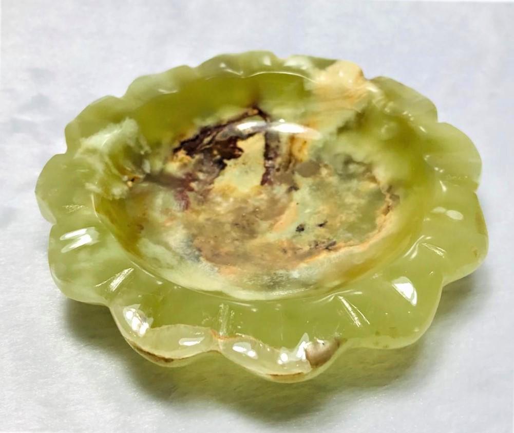 Onyx flower ashtray unique handmade piece 169.3G: Onyx stone flower ashtray unique handmade piece - 98mm - 169.3G Shipping: $23.00. Shipping rates are determined by Parcel weight and destination.