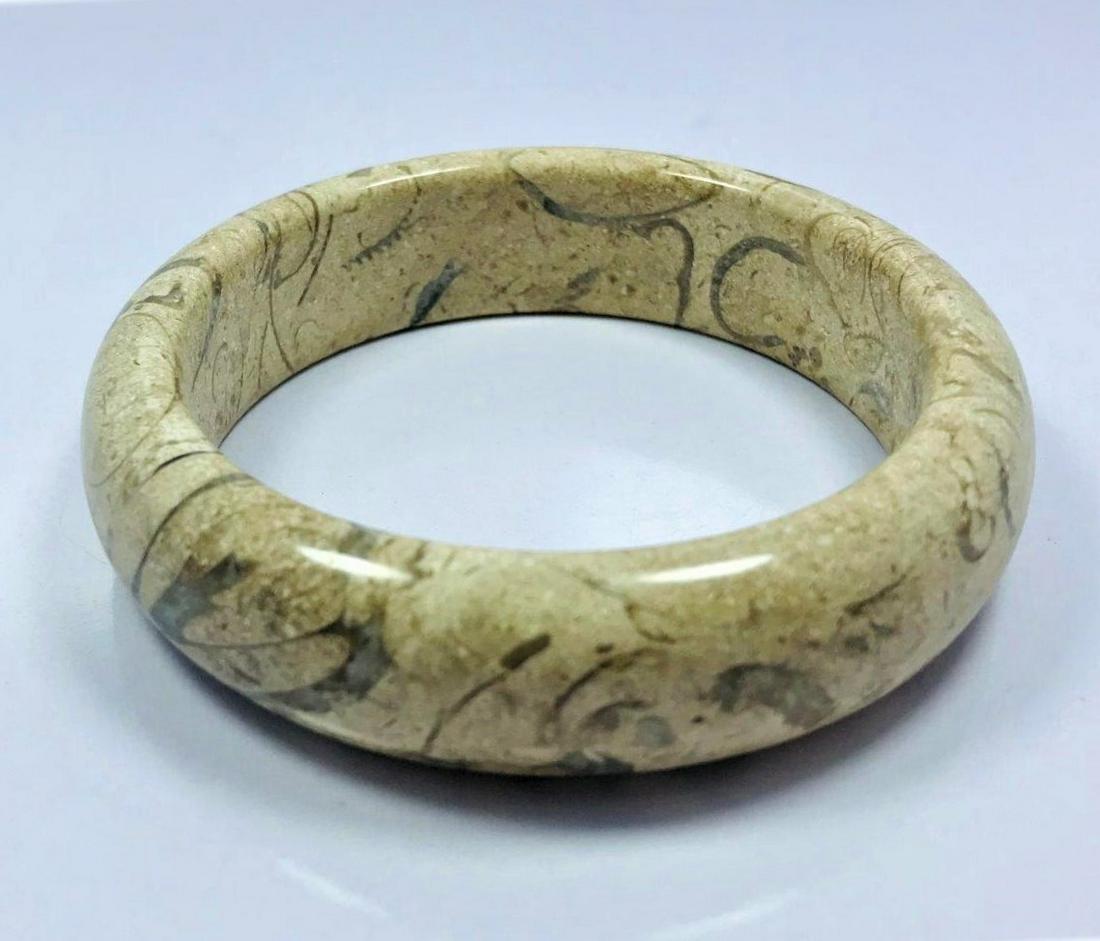 Jasper beautiful hand bangle off white color - 78.8G: Jasper beautiful hand bangle off white color - 79mm - 78.8G Shipping: $23.00. Shipping rates are determined by Parcel weight and destination.