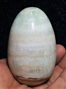 Carrabian Calcite Healing EGG - 266 Grams: Carrabian Calcite Healing EGG - 266 Grams - 76X49 mm Shipping: $36.00. Shipping rates are determined by Parcel weight and destination.