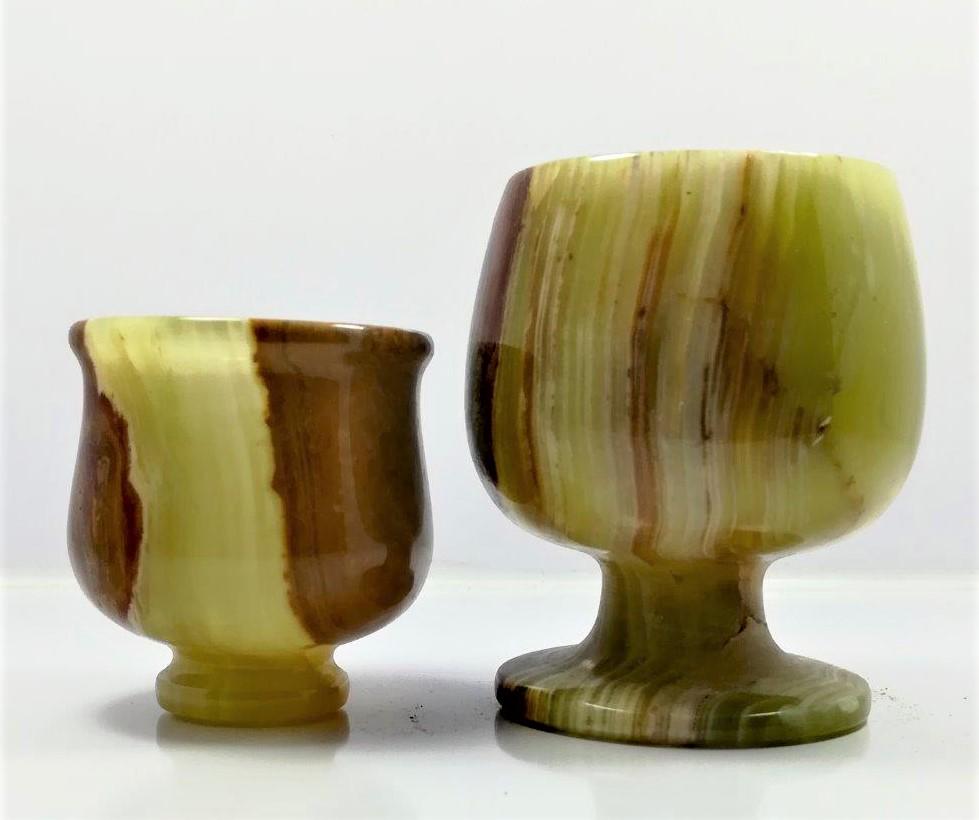 Onyx glass with small cup - 317.6 grams: Onyx glass with small cup apporximately 105.8X63.3 mm - 317.6 grams Shipping: $45.00. Shipping rates are determined by Parcel weight and destination.