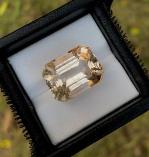 Emerald Cut Golden Topaz - 22.85 Carats: Emerald Cut Golden Topaz - 22.85 Carats - 17X13X11 mmShipping Rate: $15.00 .shipping rates are determined by Parcel weight and destination.Combined shipping: We offer combine shipping on multiple